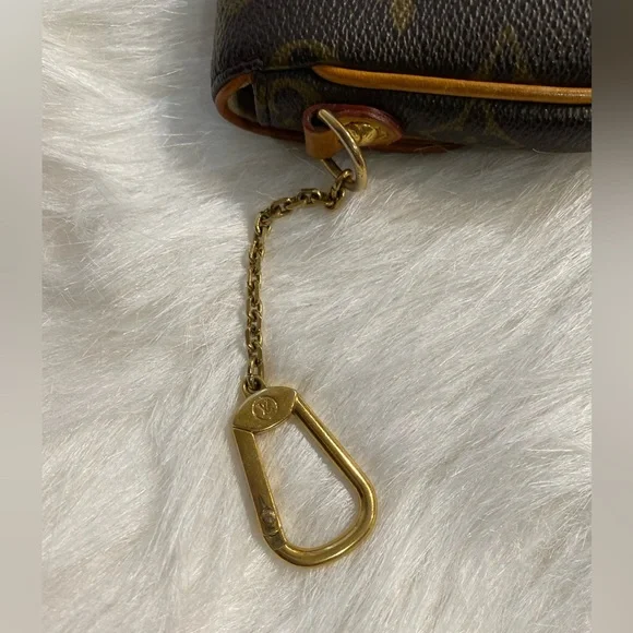 LV authentic Limited Key pouch in monogram - Picture 11 of 16